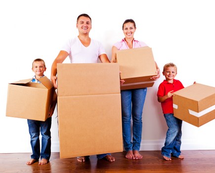 Removal team helping with a Kensington home move on a busy local street