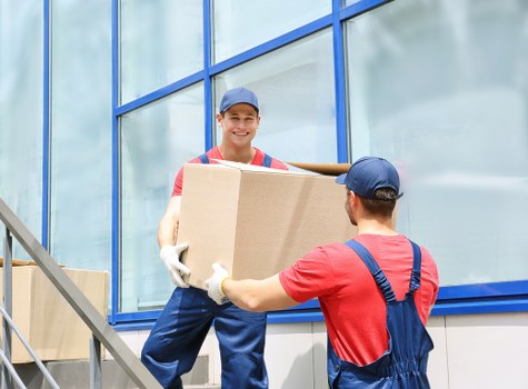 Local Kensington man and van service handling bulky items near apartment buildings