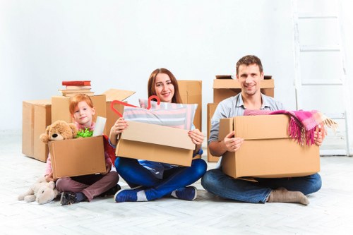 Office removals planning in Kensington with packed boxes and equipment