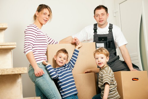 Preparing boxes and furniture for a Kensington moving van
