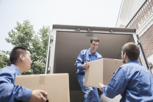 Moving boxes and household items in a Kensington flat relocation
