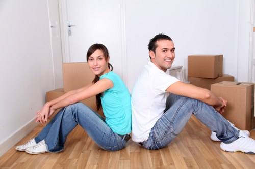 Moving team handling a flat relocation in Kensington