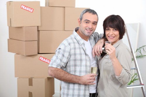 Household boxes and furniture being loaded for a Kensington move